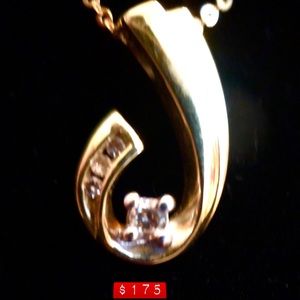 Yellow gold and diamond pendant.